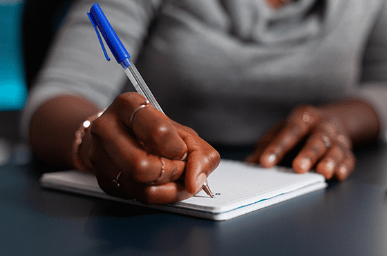 bigstock-Close-Up-Of-Hand-Holding-Pen-T-446282081